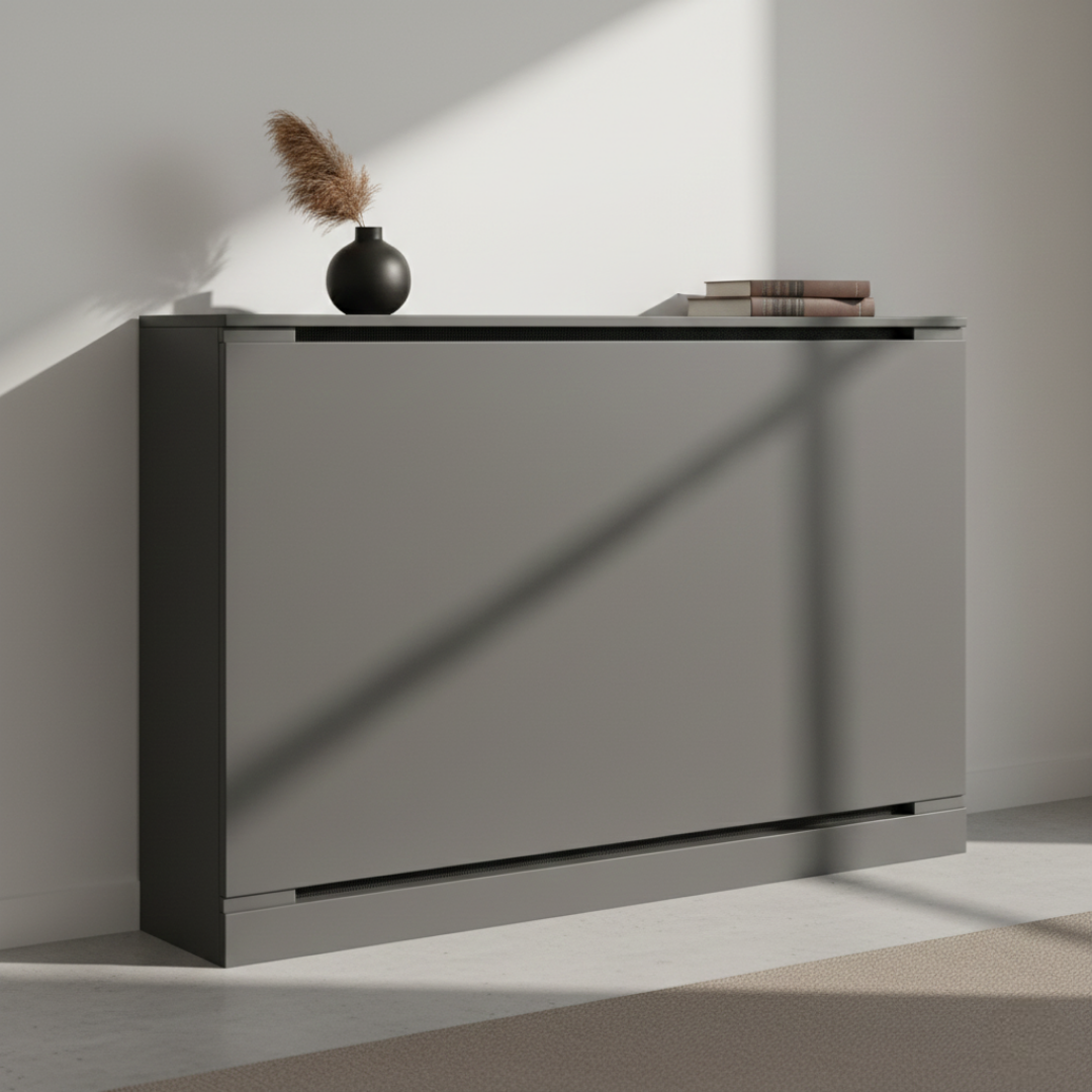 Seamless Shadow: A handle-less push-to-open front in charcoal gray.
